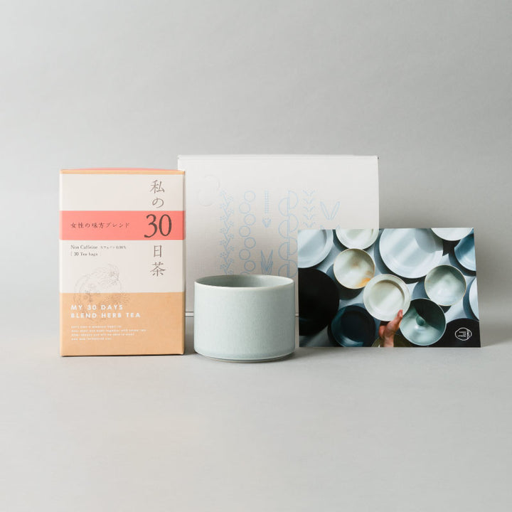A variety of uses! Multi-use cup in gray-blue and a women's ally blend herbal tea set